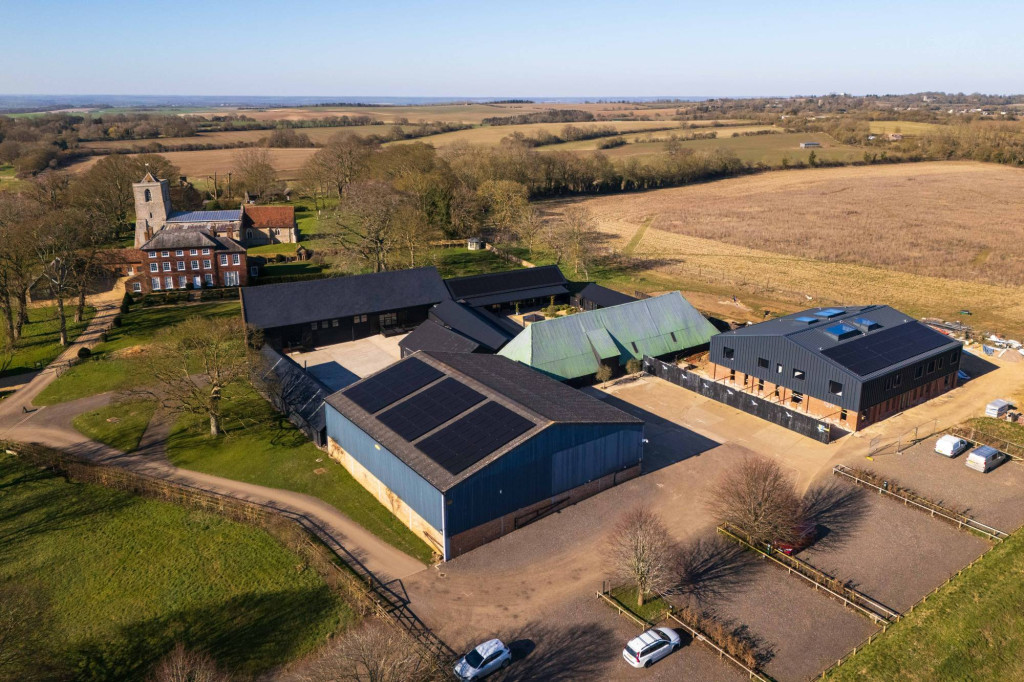 Aerial view of the Sandon Manor estate with solar panels on the barns